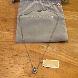 Michael Kors Silver Tone Stainless Steel Round MK Logo Pendant Necklace NWT